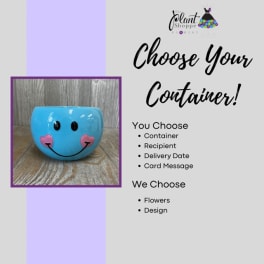 Blue smiley-face ceramic container with pink cheeks
