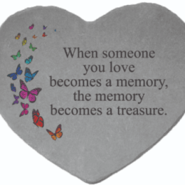 Gray heart-shaped memorial plaque with colorful butterflies and a sympathy quote