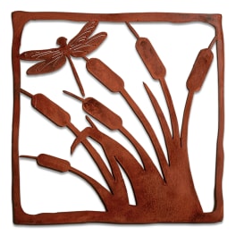 Rust-colored metal wall art with cattails and a dragonfly