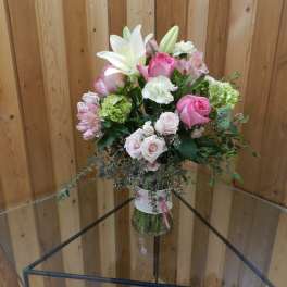 Pink and white mixed bouquet in a glass vase