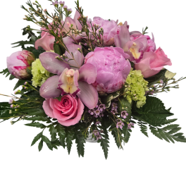 Pink and lavender bouquet with orchids, roses, and peonies