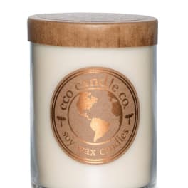 Soy wax candle in a glass jar with a wooden lid