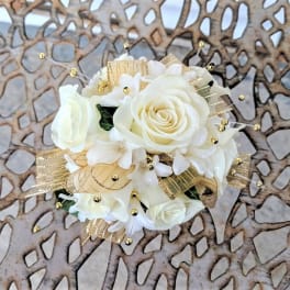 White rose bouquet with gold ribbon and bead accents