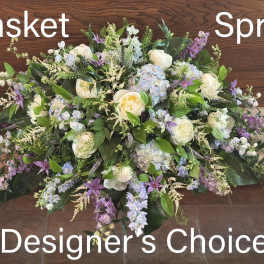 Large casket spray with white and lavender flowers