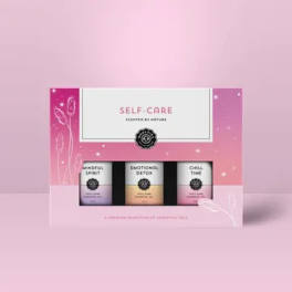 Self-care essential oil gift set with three bottles in pink and purple packaging