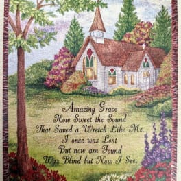 Decorative wall hanging with a church scene and printed hymn text