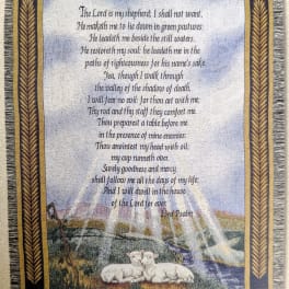 Decorative wall hanging with Psalm 23 text and two lambs in a pastoral scene