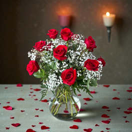 One Dozen Long Stem Red Roses in a vase