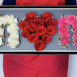 Tray with floral letters in white and pink and a red rose heart