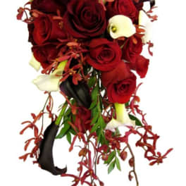 Cascade bouquet of red roses and white calla lilies