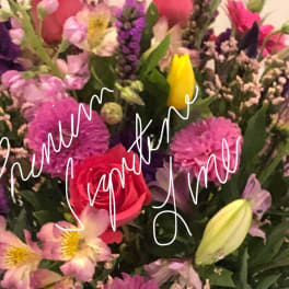 Mixed bouquet with pink, purple, and yellow flowers