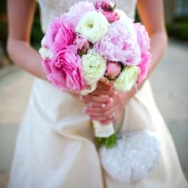 Bride holding a pink and white wedding bouquet