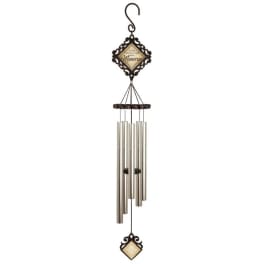Decorative wind chime with metal tubes and a framed "Memories" plaque