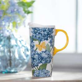 Floral travel mug with blue flowers and a yellow butterfly design