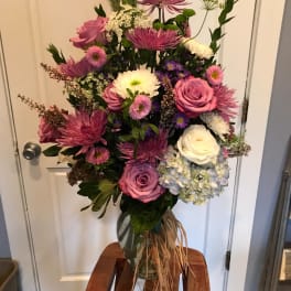 Mixed pink and white bouquet in a glass vase