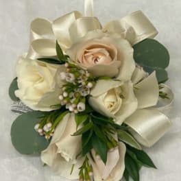 Cream rose bouquet with satin ribbon and greenery