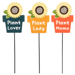 Three sunflower plant stakes with labeled pots
