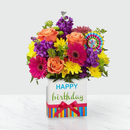 Colorful birthday bouquet in a decorated gift box