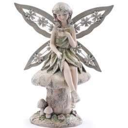 Fairy on Mushroom with Butterfly Figure