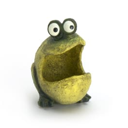 Small frog-shaped figurine with an open mouth and wide eyes
