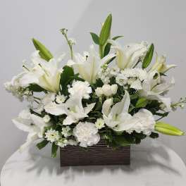 Peaceful White Lilies Basket by Teleflora