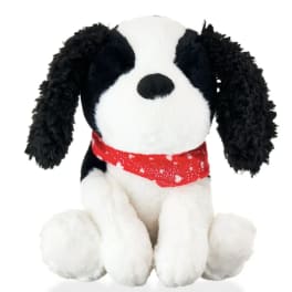 Black-and-white plush dog with a red bandana