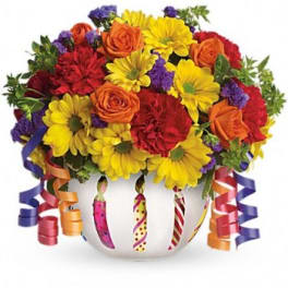 Colorful bouquet of roses and daisies in a white vase with ribbon curls