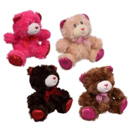 Four plush teddy bears in pink, beige, black, and brown.