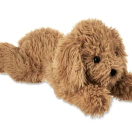 Brown plush dog toy lying down on a white background