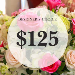Mixed bouquet of pink and white roses with a $125 designer's choice label