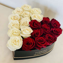 Heart-shaped box of red and white roses