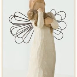 Wooden angel figurine with wire wings and a long cream dress