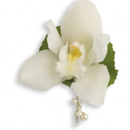 White orchid corsage with pearl accents