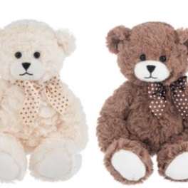 Two plush teddy bears with polka-dot bows, one cream and one brown.