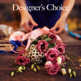 Pink bouquet with ribbon on a table