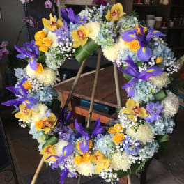 #162 blue, white, and orange open wreath