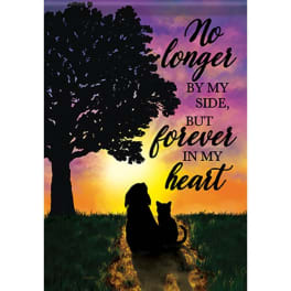 Memorial plaque with a tree, cat and dog silhouettes, and a sunset quote