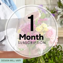 Person holding a pink and yellow mixed flower bouquet with a subscription label