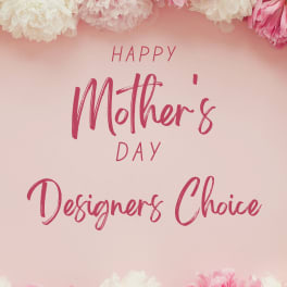 Pink Mother's Day sign framed by white and pink flowers