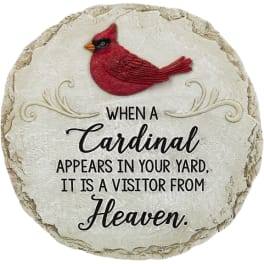Round memorial plaque with a red cardinal and sympathy text