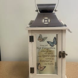 Decorative memorial lantern with butterflies and a sympathy message