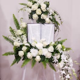 White easel spray with Bible