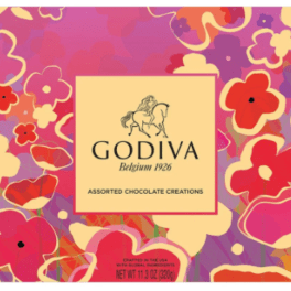 Rectangular Godiva chocolate box with colorful abstract flowers in pink, red, and yellow