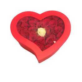Heart-shaped box filled with red roses and one white rose