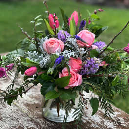 Colorful mixed bouquet in a clear glass vase