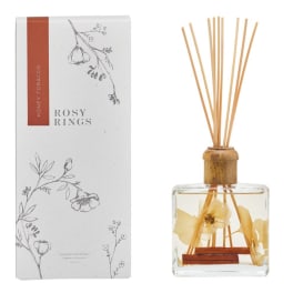 Floral reed diffuser in a glass bottle with boxed packaging