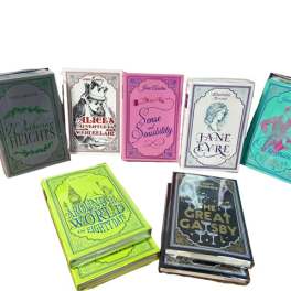 Stacked decorative book-shaped boxes in assorted colors