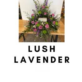 Lavender and pink floral arrangement with green accents