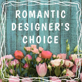 Assorted pink roses and tulips against teal wood with 'Romantic Designer's Choice' text.