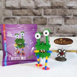 Toy block creature set with a purple package and a small display stand